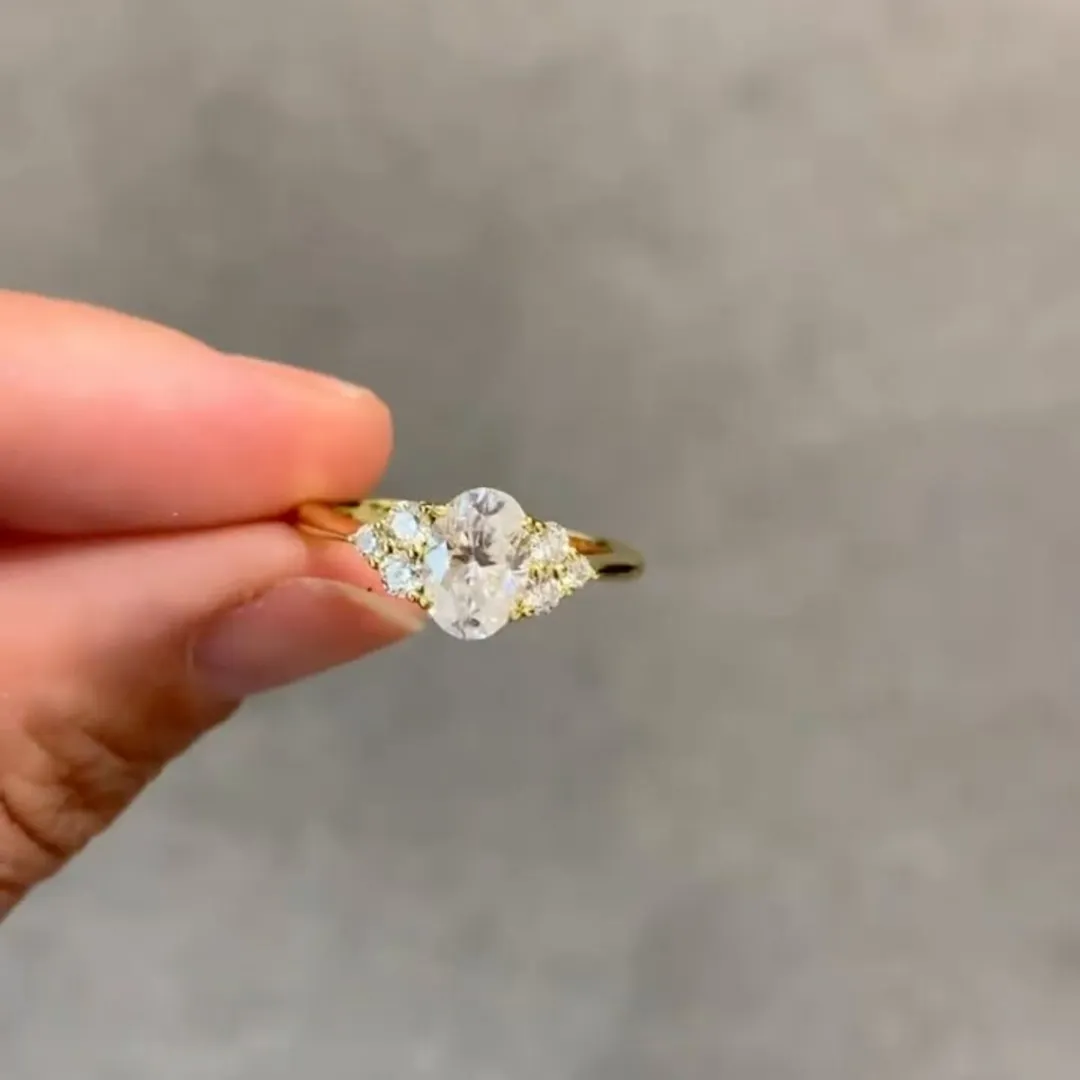 /public/photos/live/Oval Cut Cluster Moissanite Engagement Ring 673 (3).webp